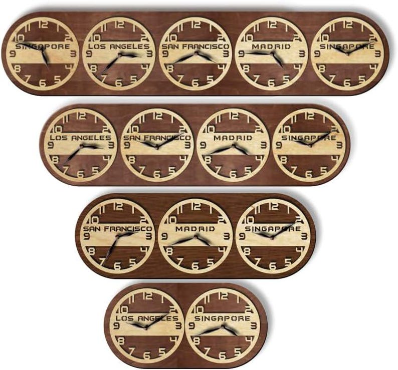 May include: A collection of wooden world clocks, each displaying a different time zone. The clocks are round with a light-colored face and dark hands, set against a dark brown wooden base. The time zones include Singapore, Los Angeles, San Francisco, and Madrid.