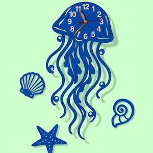May include: A blue jellyfish-shaped wall clock with white numbers and gold hands. Decorative sea-themed wall art includes a starfish, seashell, and spiral shell. The clock is mounted on a light green wall.