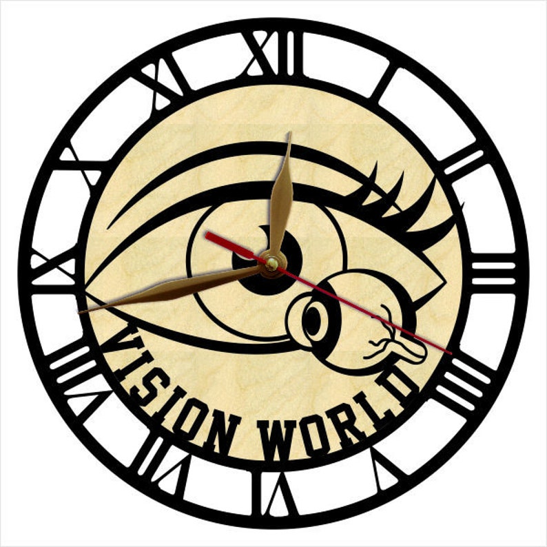 May include: Black and white clock with a stylized eye design and the text "Vision World". The clock has Roman numeral markings.
