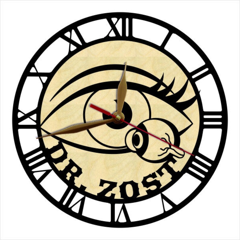 May include: Black and white clock with Roman numerals. The clock face features a stylized eye with eyelashes and the text "Dr. Zost".