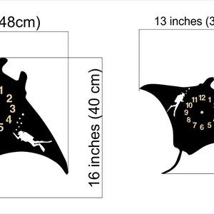 May include: Black manta ray wall clock with diver silhouettes and gold-colored numerals. The larger clock is 19 inches (48cm) wide and 16 inches (40 cm) tall. The smaller clock is 13 inches (33cm) wide and 11 inches (27.5 cm) tall.