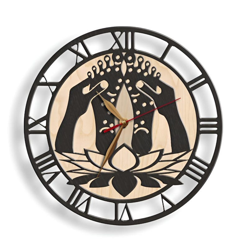 May include: A black and white wooden wall clock with a design of two hands holding a lotus flower. The clock face has Roman numerals and a black and white design of two hands holding a lotus flower.