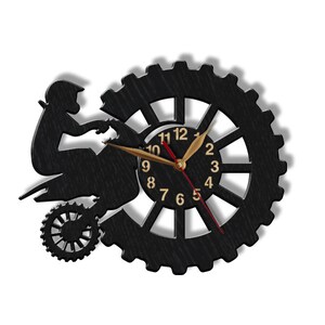 May include: Black silhouette of a person riding an ATV, with a clock face in the background. The clock face has gold numbers and hands, and a red second hand.