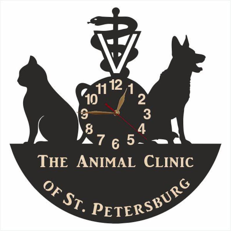 May include: Black and white clock with a cat and dog silhouette, a caduceus symbol, and the text "The Animal Clinic of St. Petersburg".