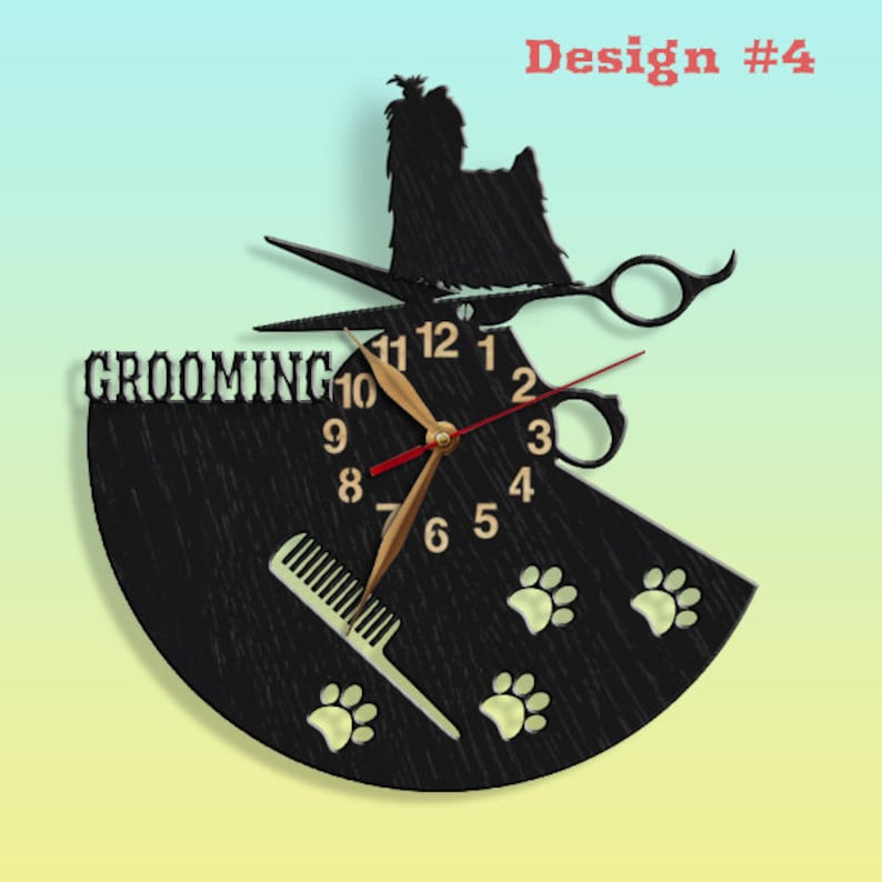 May include: Black wooden clock with a grooming theme. It features a silhouette of a dog, scissors, a comb, and paw prints. The clock face has the words "Grooming" and the numbers 1 through 12.