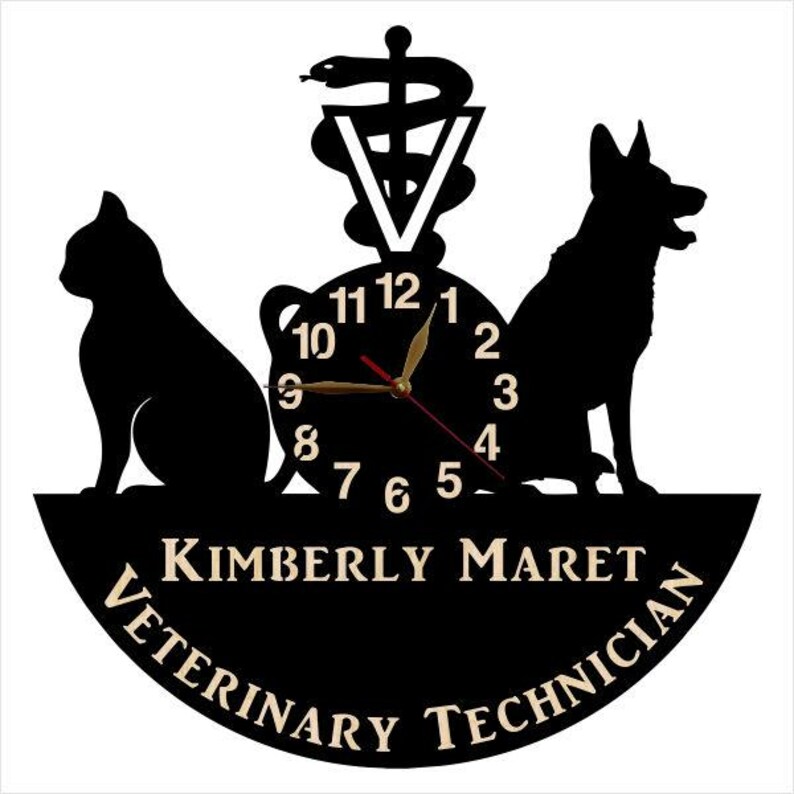 May include: Black and white silhouette of a cat, dog, and the caduceus symbol with a clock face in the center. The clock face has black Roman numerals and gold hands. The text "KIMBERLY MARET VETERINARY TECHNICIAN" is written in a gold font around the clock face.