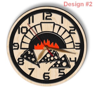 May include: A wooden clock with a black and white design of a pizza in a wood-fired oven. The clock face has black numbers and hands. The pizza is in the shape of a slice and has red and white pepperoni, cheese, and mushrooms.