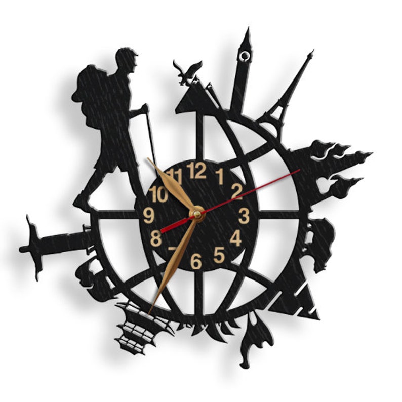 May include: Black clock with a silhouette of a hiker and various landmarks around the clock face. The clock face has gold numbers and hands.