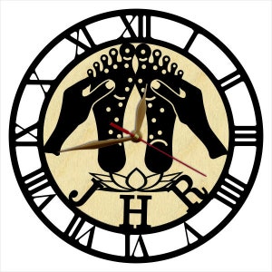 May include: Black and white clock with a wooden face featuring a stylized image of two feet receiving a foot massage. The clock face has Roman numerals and a black clock hand.