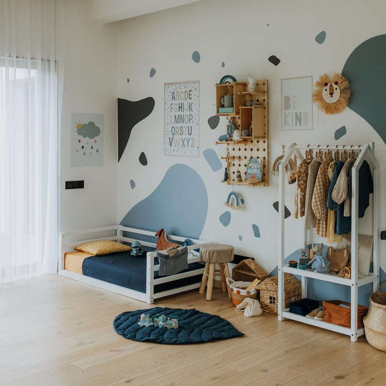 Low-profile open closet system allowing toddlers to choose clothes without parents' help