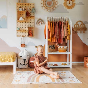 Accessible child wardrobe rack encouraging practical life skills and neatness