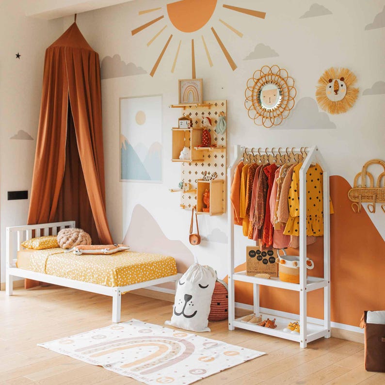 House-frame open hanger stand designed to teach early organizing habits