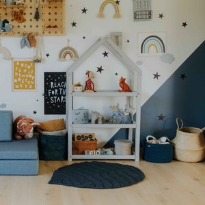 storage for toys
toy storage shelf
boho nursery shelf
baby bookshelves
montessori toyshelf
playroom shelves
kids storage bench
baby toy shelf
playroom shelf
kids room shelf
bookshelf with pegs
shelf for books
frontfacing books
wood book storage