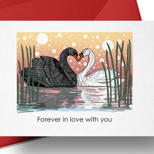 May include: A greeting card with a black and white swan couple forming a heart shape with their necks. The swans are in a pond with green reeds and a pink and orange sunset background. The text "Forever in love with you" is printed below the swans.
