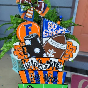 Welcome to the swamp, 27x19 Florida gators, Wood Door Hanger, pick your team and colors