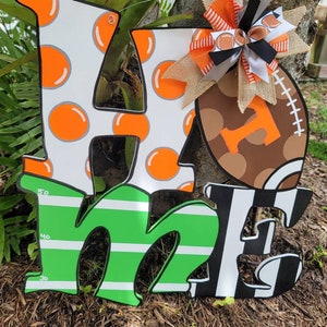 Home Football, can be any team you want.  Tennessee Vols Wood Door Hanger, pick your team and colors