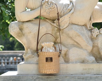 Modern straw bag with leather top handles and long shoulder strap, high quality wicker bucket basket, handmade luxury summer tote, unique