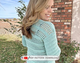 May include: A light mint green long-sleeve crochet sweater featuring a textured pattern with alternating solid and openwork mesh sections. The garment has a ribbed hem and cuffs. The text "bookedonhomemadehappiness.com" and "PDF PATTERN DOWNLOAD" appear.
