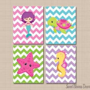 May include: Set of four printable wall art prints featuring a mermaid, a sea turtle, a starfish, and a seahorse. Each image is set against a chevron patterned background in a different color combination.