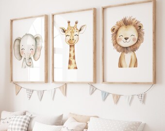 May include: Three framed watercolor prints featuring a smiling elephant, giraffe, and lion. The prints have light brown wooden frames and are hung above a bench with pillows. A banner of small flags hangs below the prints.