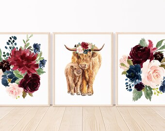 May include: Set of three watercolor prints featuring a Highland cow with a floral crown and her calf, along with two floral arrangements in shades of burgundy, pink, and navy blue.