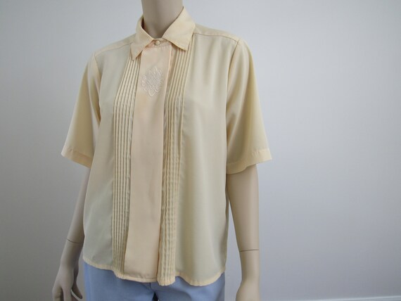 pastel yellow blouse