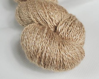 50/50 baby camel and mulberry silk, hand spun yarn, heavy lace/fingering weight