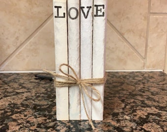 Standing stamped books - LOVE