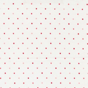 May include: White fabric with a repeating pattern of small pink and red dots.