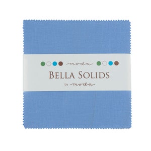 May include: A light blue fabric square with the text "moda Bella Solids by moda" on a white label.