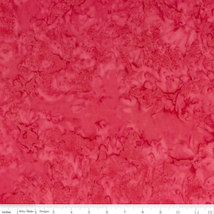 May include: Red batik fabric with a marbled pattern. The fabric has a soft, flowing texture and a subtle sheen.