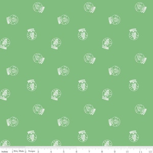 May include: A seamless pattern featuring white snow globes with a small pine tree inside on a green background.