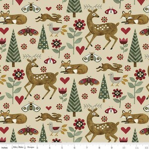 May include: A beige fabric with a repeating pattern of deer, foxes, butterflies, birds, trees, and flowers. The pattern is in shades of brown, green, red, and white.