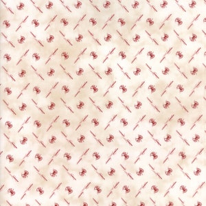 Needle and spool of thread color natural with Red print  Designed by primitive Gatherings   sold by the yard  Moda # 1231 11