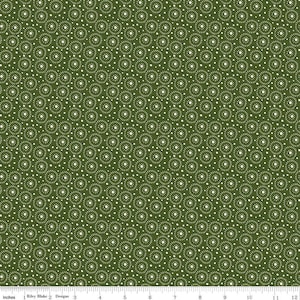 Può includere: Un tessuto verde con un motivo ripetitivo di cerchi bianchi con piccoli punti bianchi attorno al bordo. Il tessuto è largo 12 pollici.