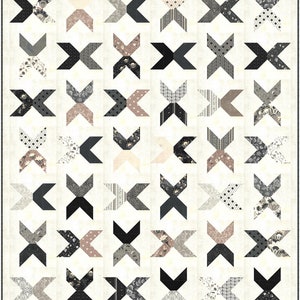 Pode incluir: Um padrão de colcha com fundo branco e formas geométricas pretas e cinzas. As formas são organizadas em um padrão repetitivo de cruzes.