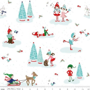 May include: White fabric with a repeating pattern of elves, reindeer, and Christmas trees. The elves are wearing red and green clothing and are engaged in various activities, such as singing, playing, and sledding. The reindeer is brown and has a blue bow around its neck. The Christmas trees are green and have white snow on them.