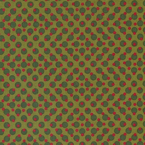 Op de afbeelding: Groene stof met een herhalend patroon van rode en groene cirkels.
