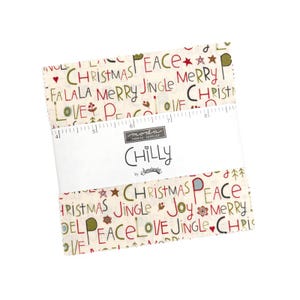 May include: A stack of square fabric pieces featuring a cream background with red, green, and black holiday-themed text and small icons. A white paper band wraps around the center, displaying the text Moda Fabrics Supplies Chilly by Sweetwater.