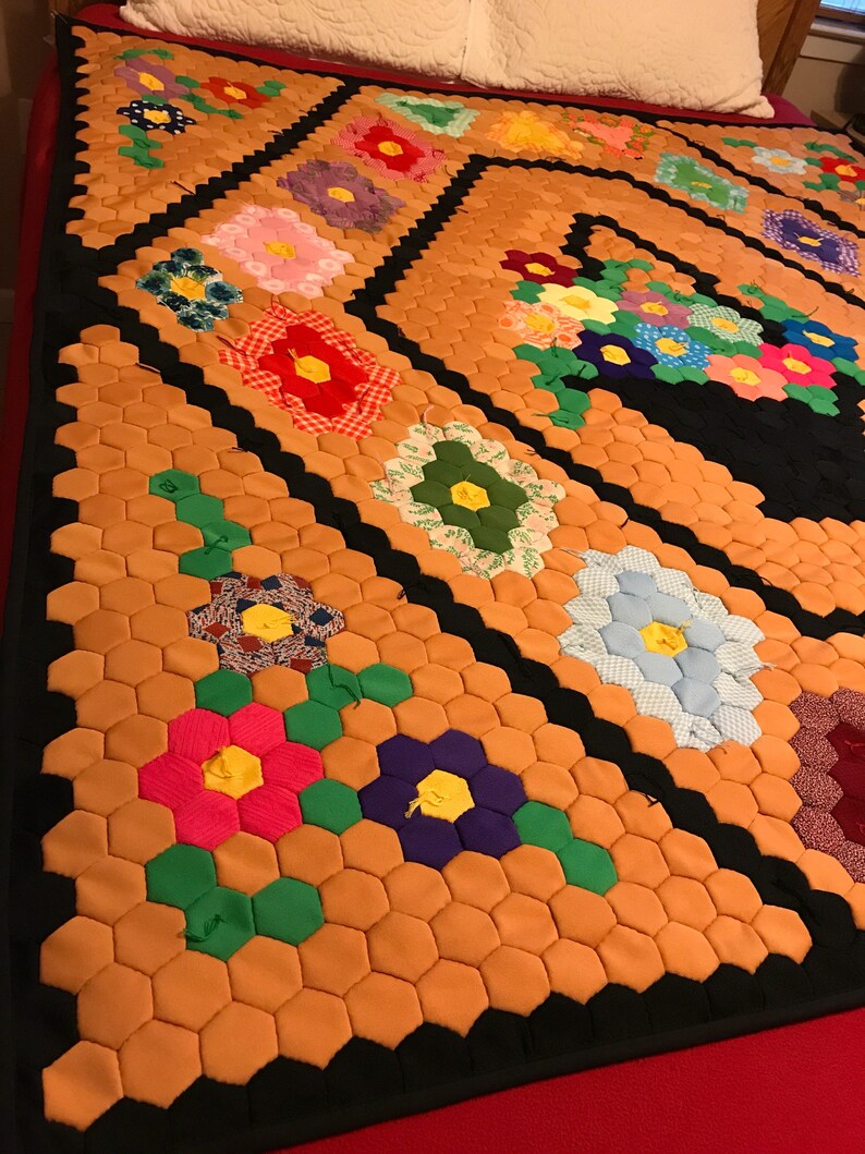 Vintage polyester flower basketgarden quilt top newly quilted with cotton batting and backing lap size 53 wide and 63 long