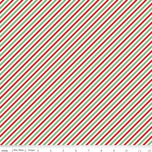 May include: White fabric with diagonal red and green stripes. The fabric is marked with inches.