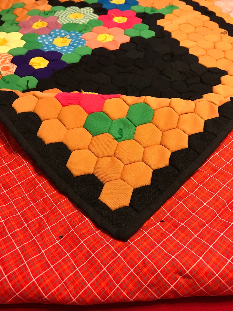 Vintage polyester flower basketgarden quilt top newly quilted with cotton batting and backing lap size 53 wide and 63 long