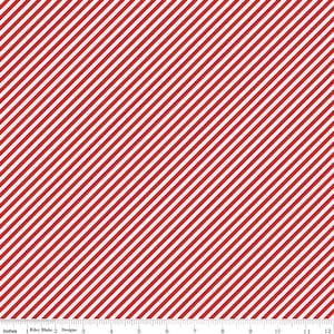 May include: Red and white diagonal striped fabric. The stripes are evenly spaced and run from the top left to the bottom right. The fabric has a ruler at the bottom with the text "Inches" and "Riley Blake Designs".