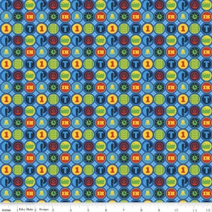 May include: A blue fabric with a repeating pattern of colourful circles. Each circle contains a different train-themed icon, including a bell, a wheel, a train engine, and the number "1".