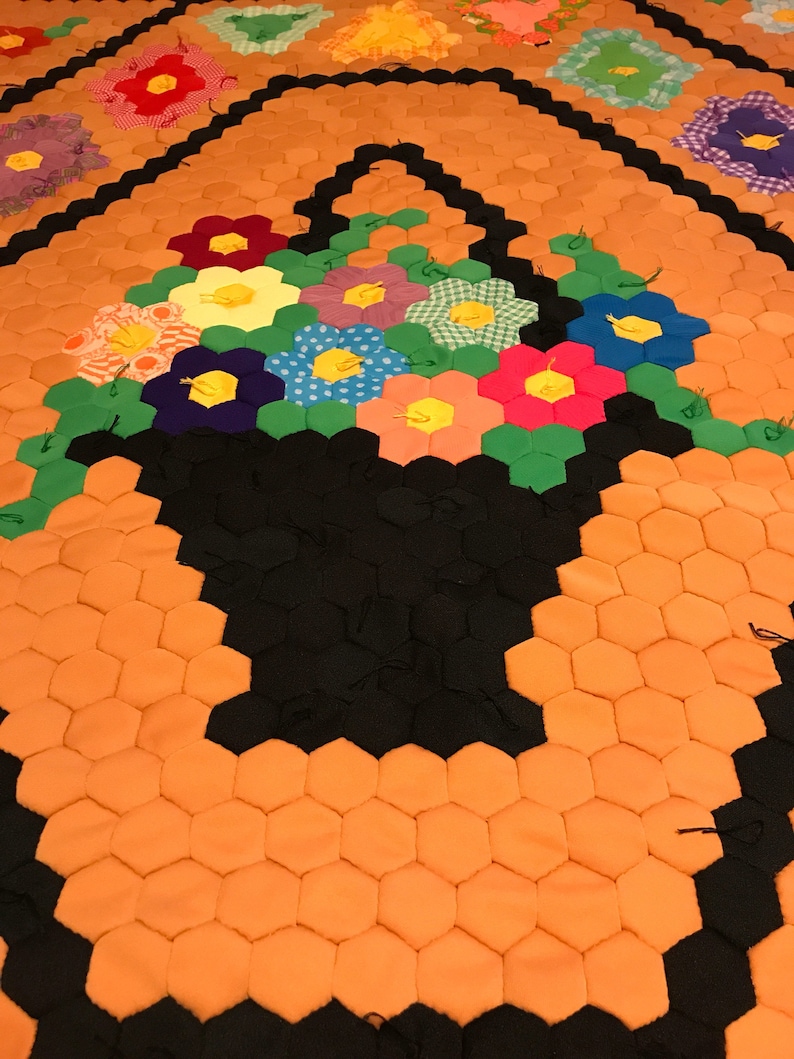 Vintage polyester flower basketgarden quilt top newly quilted with cotton batting and backing lap size 53 wide and 63 long