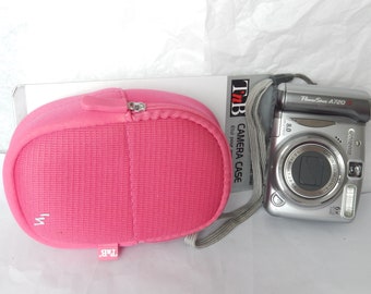 Canon PowerShot A720 is Optical Zoom 6x 8Mp Compact digital camera. Camera canon power shot A720is Wrist strap + pink case. Ok Tested