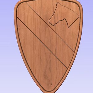 May include: A wooden shield with a carved horse head and a diagonal stripe. The shield is a dark brown color and has a smooth, polished finish.