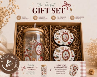 May include: A gift set in a brown box includes a 16 oz glass tumbler with a wooden lid and straw, and two neoprene car coasters. The tumbler and coasters feature a decorative design with a castle, books, and bows. The text "The Perfect Gift Set" is at the top.