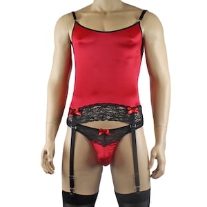 May include: A red satin lingerie set featuring a camisole with black trim and spaghetti straps, paired with a matching thong. The thong has black lace detailing and red bows. Black garter straps complete the set.