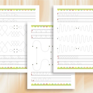 May include: Four black and white printable worksheets with dotted lines for tracing various shapes and patterns. The worksheets include lines, circles, zigzags, waves, and hearts.